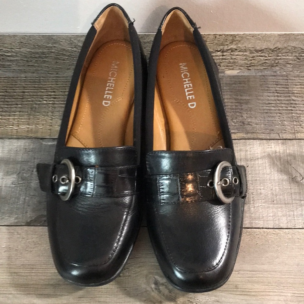 Woman’s MichelleD Noreen black slip ons with buckle detail size 6